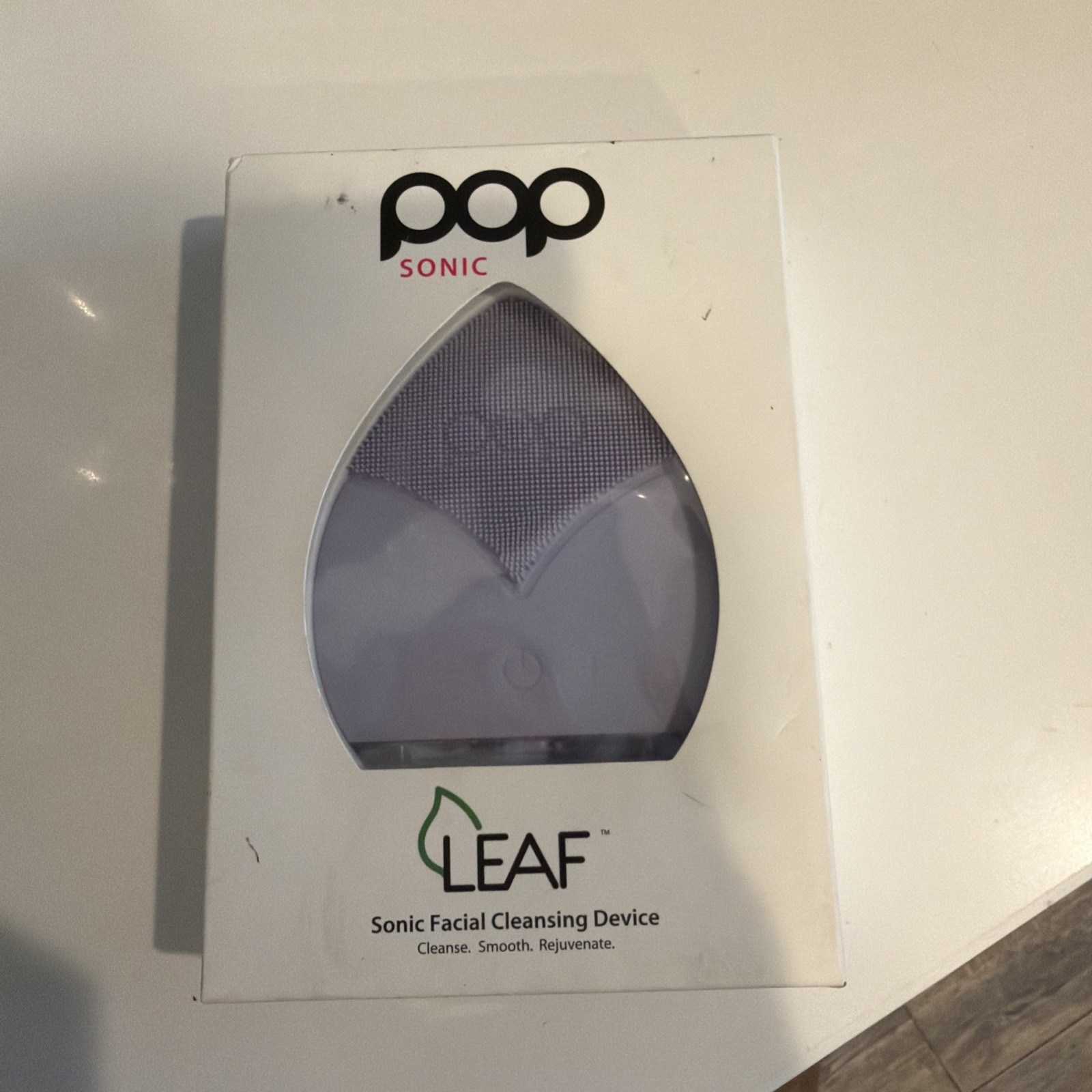 NEW IN BOX – Pop Sonic Leaflet Facial Cleansing Device Purple