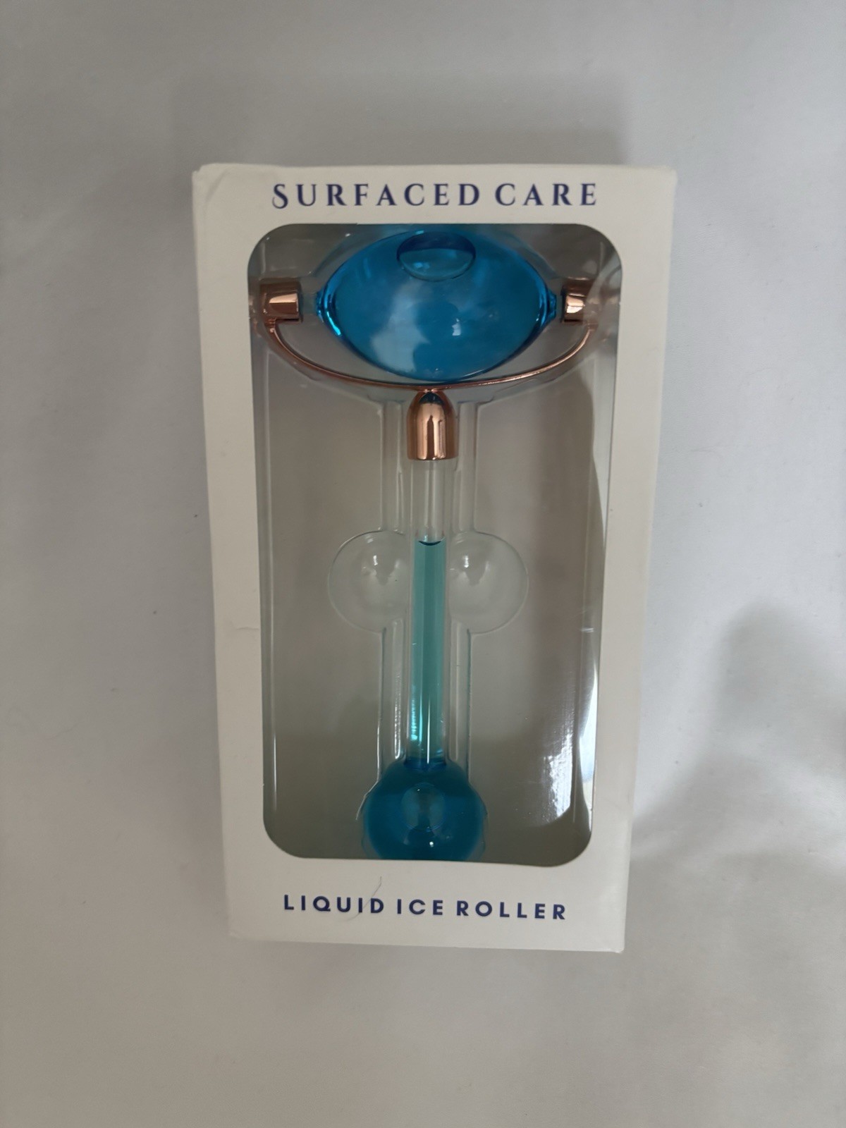 Surfaced Care Liquid Ice Roller Facial Massager, Glass Material, Blue Color