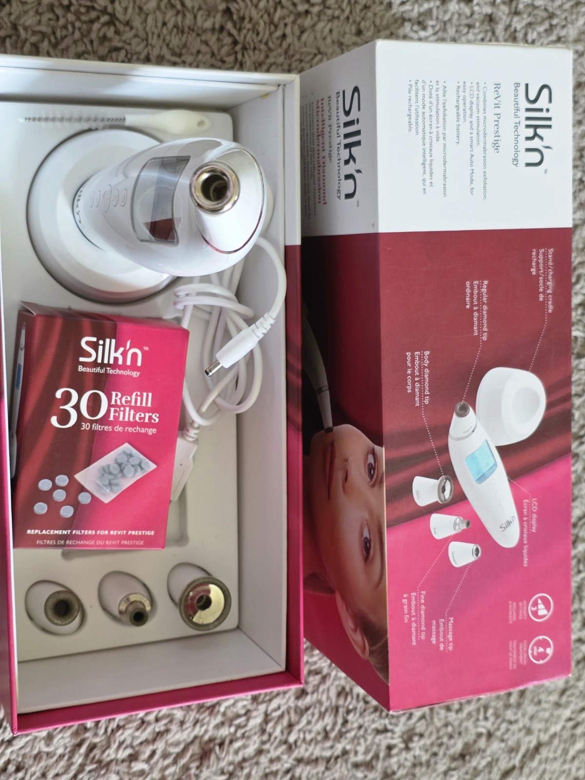 295$ Silk’n Facial Cleansing & Exfoliation Device in White with Blue LCD Massage