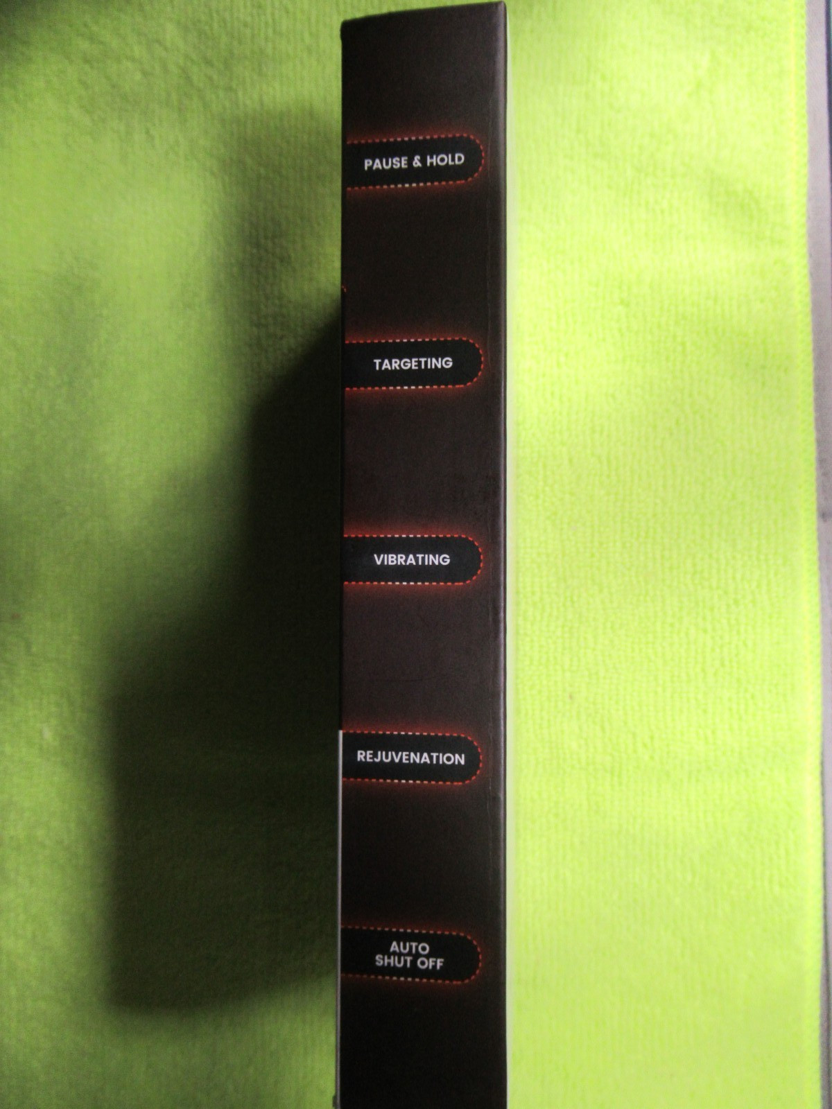 iHome Vibrating Facial Wand with Red Light LED Technology.