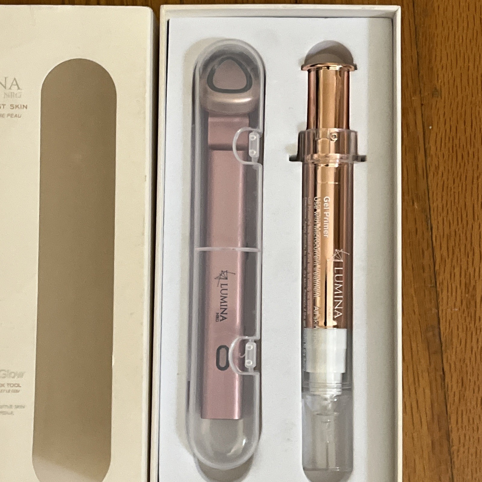 Lumina NRG Mini Glow multifunction eye face and neck tool + gel primer