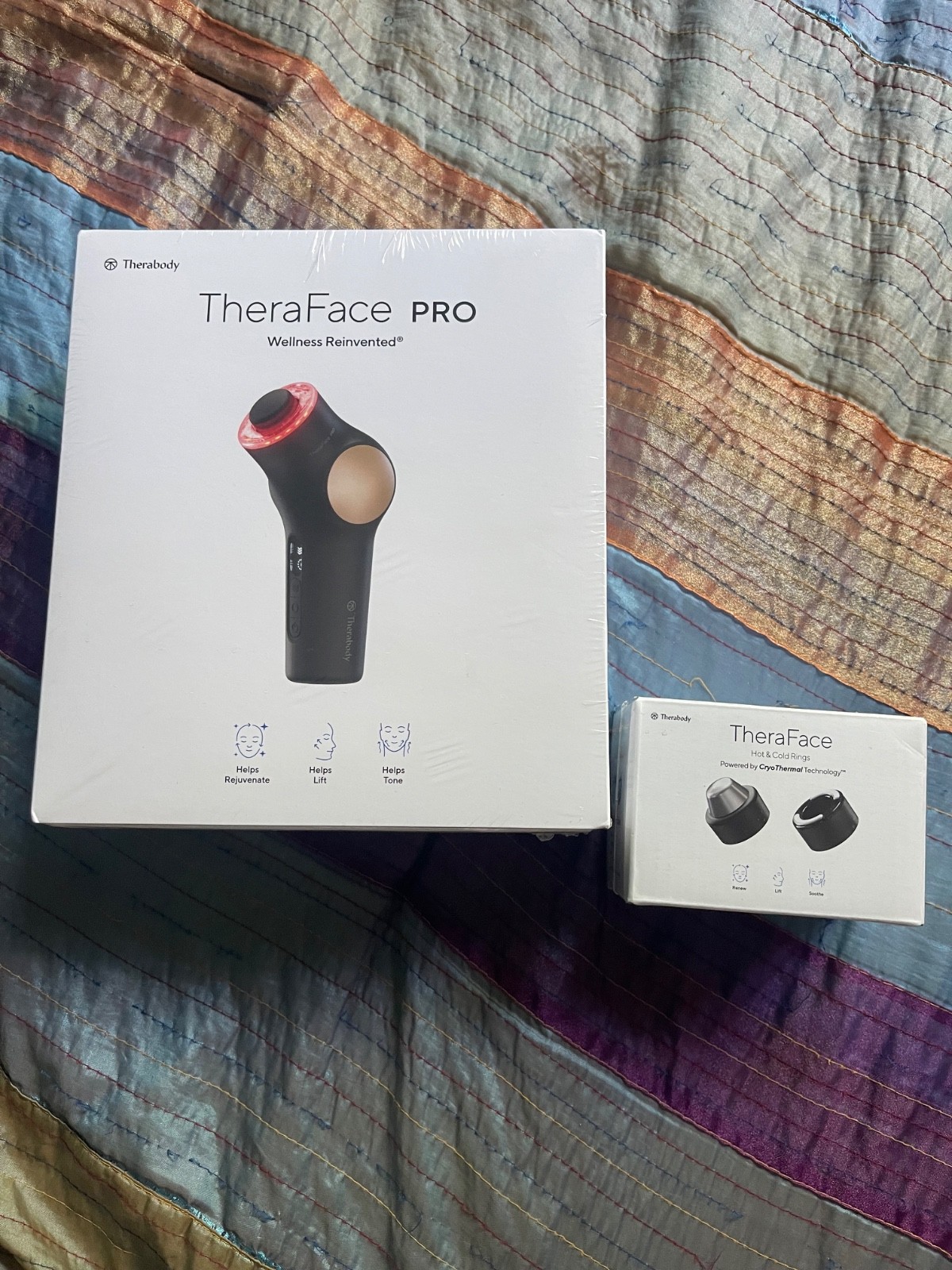 TheraFace Massager -Sealed in box. Black w/ hot and cold rings. $530 retail