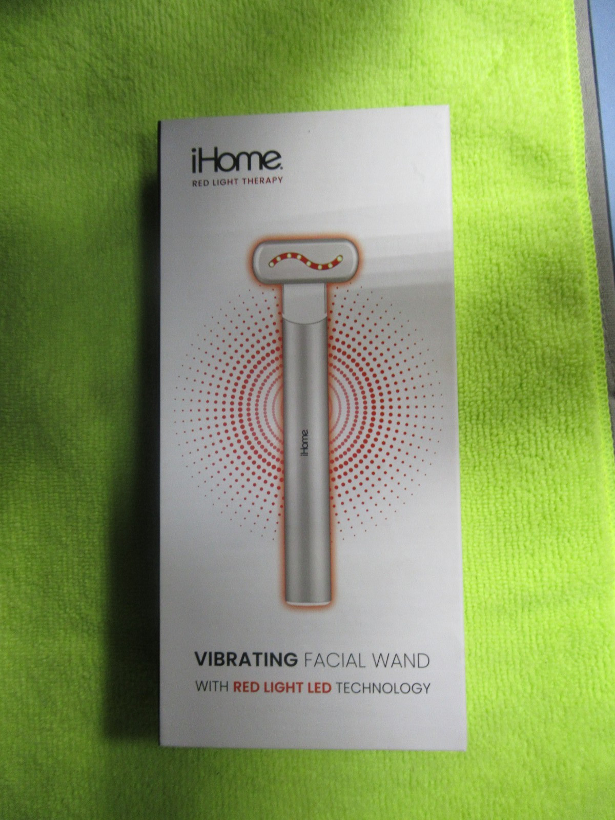 iHome Vibrating Facial Wand with Red Light LED Technology.