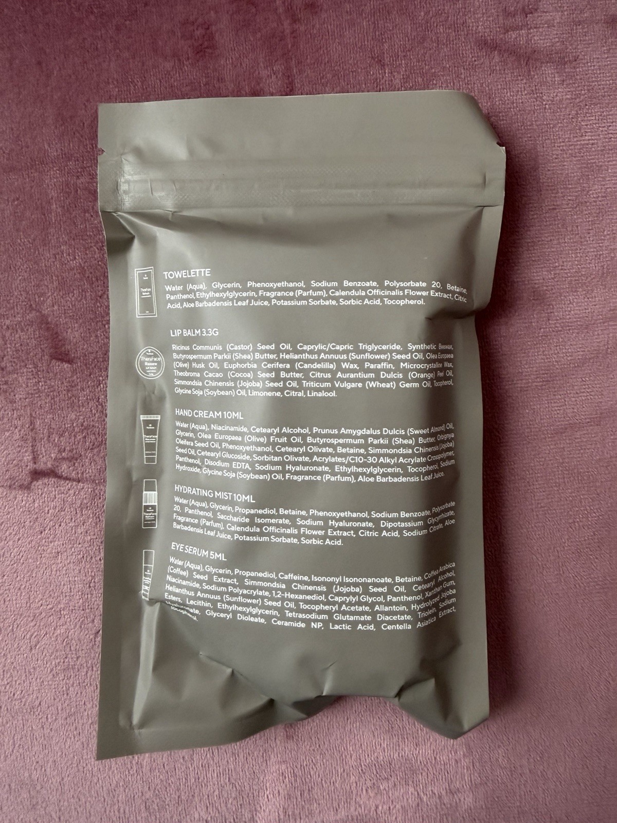 Therabody TheraFace Wellness Kit Lip Balm Hand Cream Mist Eye Serum Towelette 5