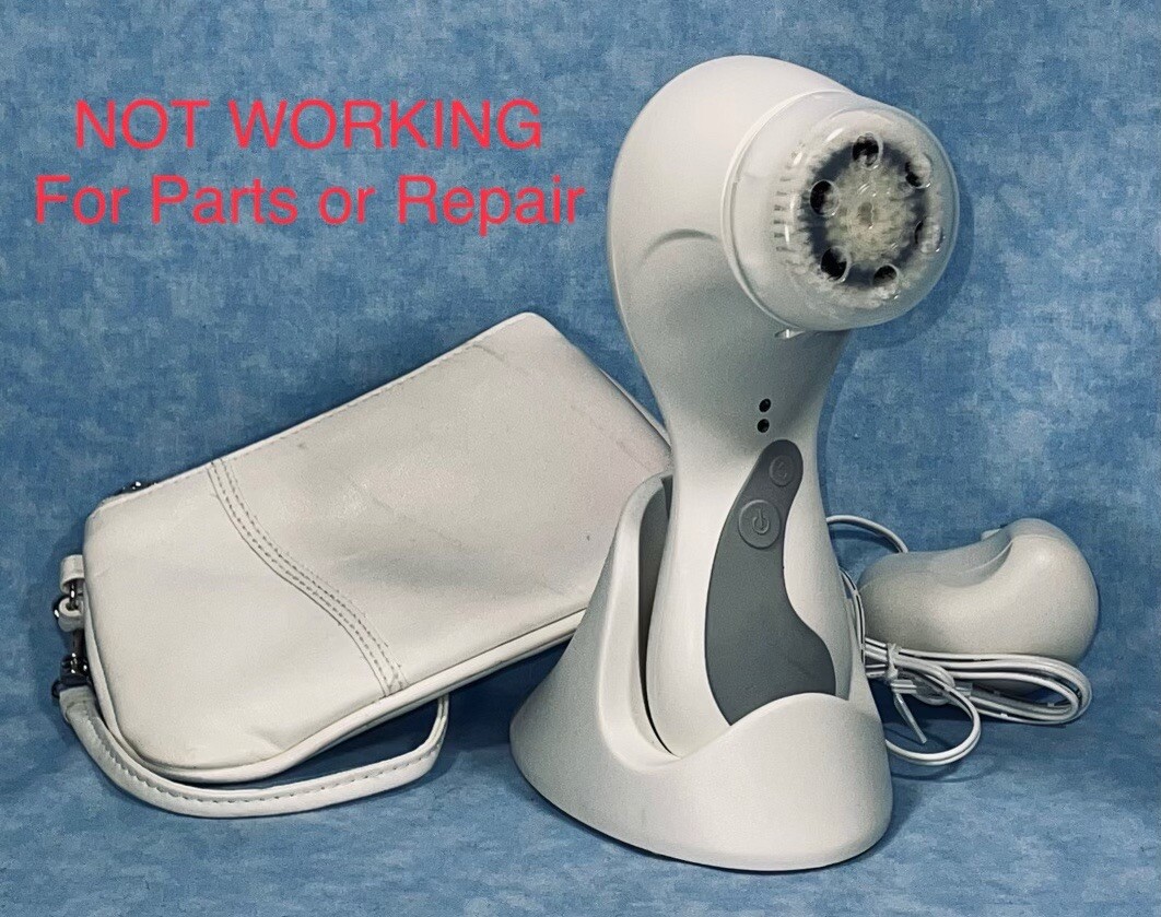 Clairsonic Skin Care System NOT Working Sold For Parts with Zip Bag SOLD AS IS!