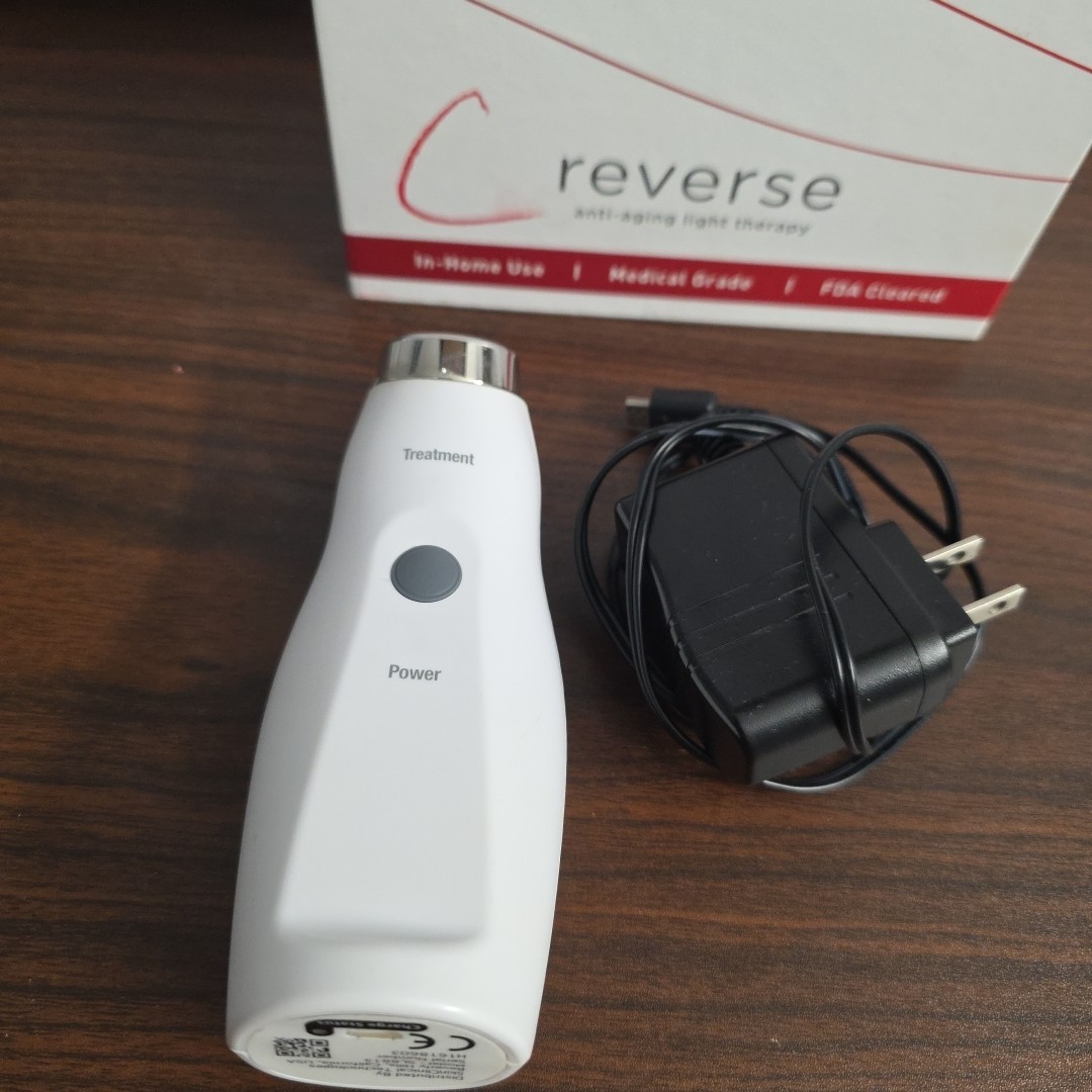 Reverse Skin Clinical LED hand held facial device A