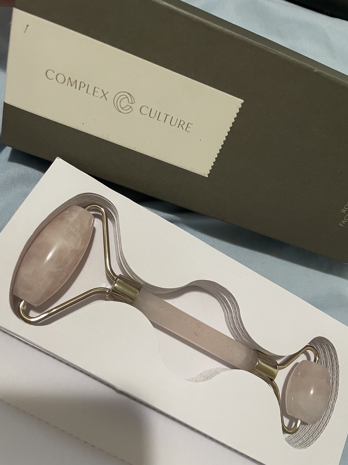 Complex culture rose quartz facial toning roller new in box full size