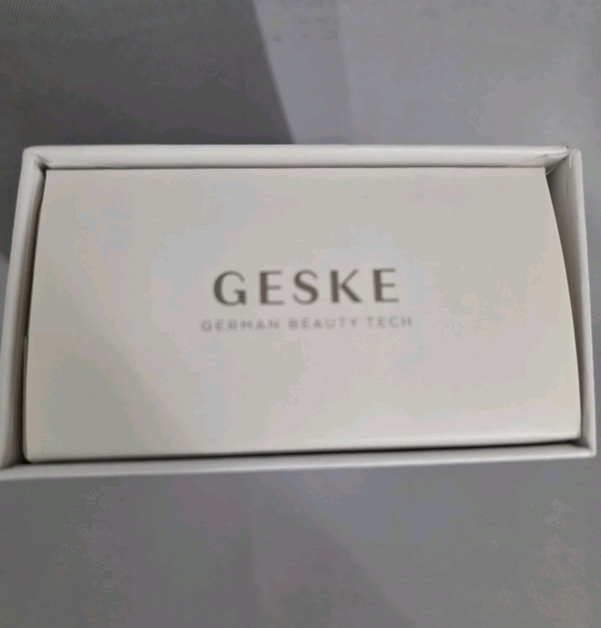 New GESKE 6-in-1 Red SonicThermo FacialBrush SmartAppGuided Cleaner/Massager $65
