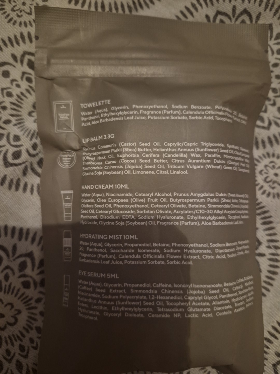 Therabody TheraFace Wellness Amenity Kit Lip Balm Handcream Eye Serum Towelette