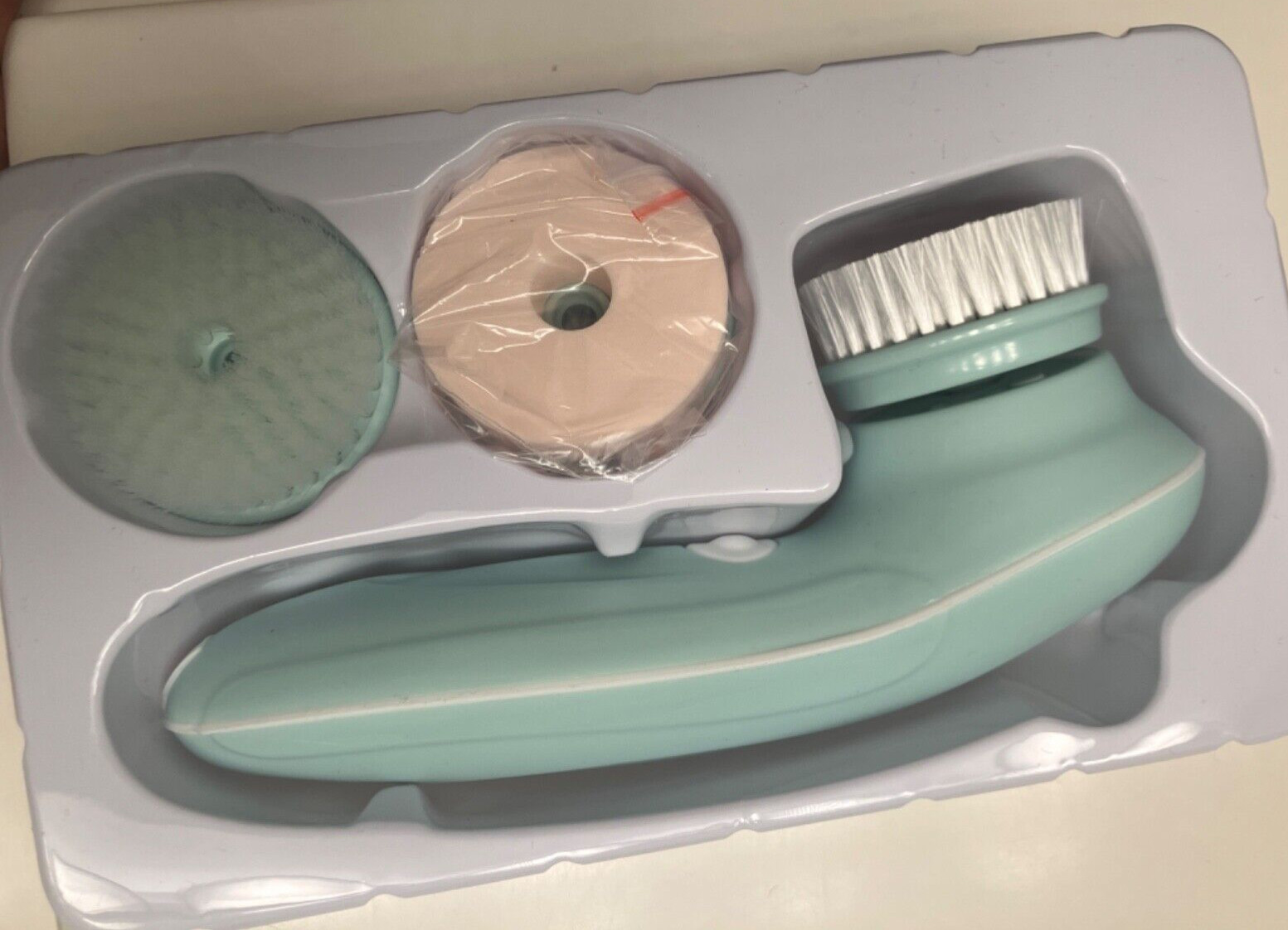 clarasonic brush with replacement brush usb cord in pink and blue