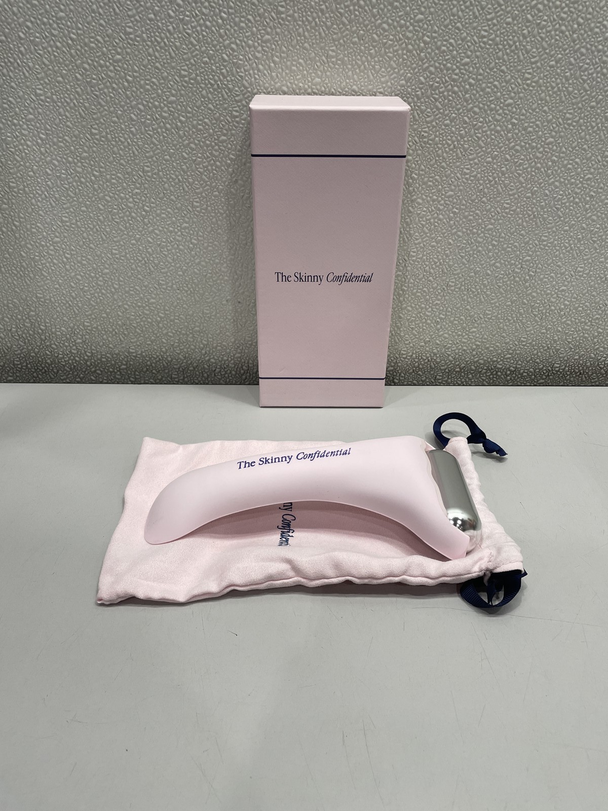 The Skinny Confidential Stainless Steel Ice Facial Roller, Pink