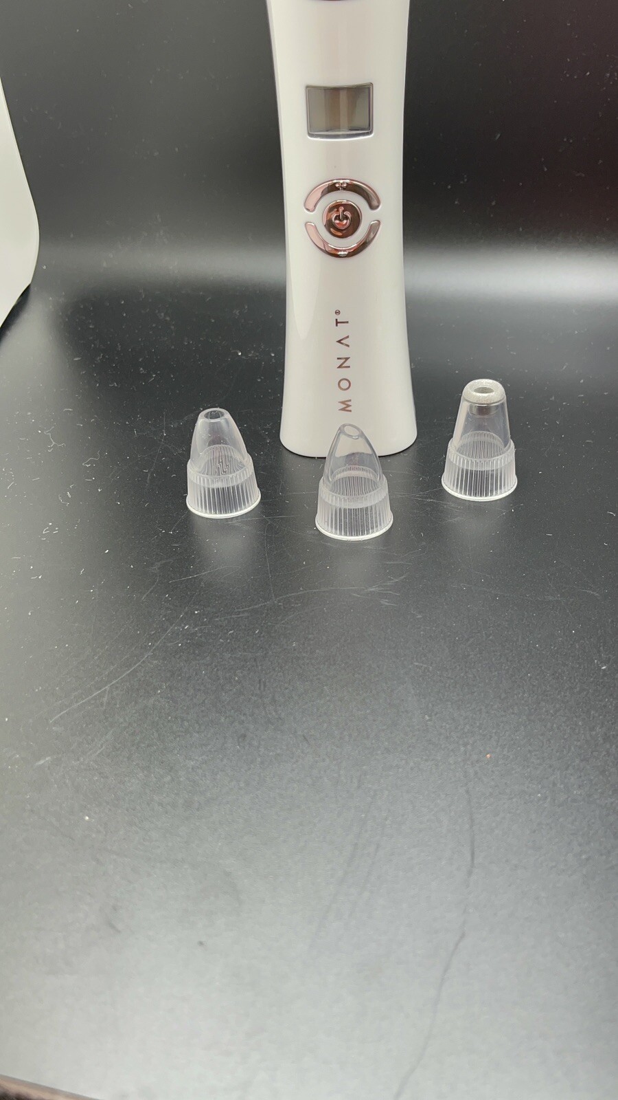 Monat Pore-Cleansing Facial Vacuum with four heads, rechargable
