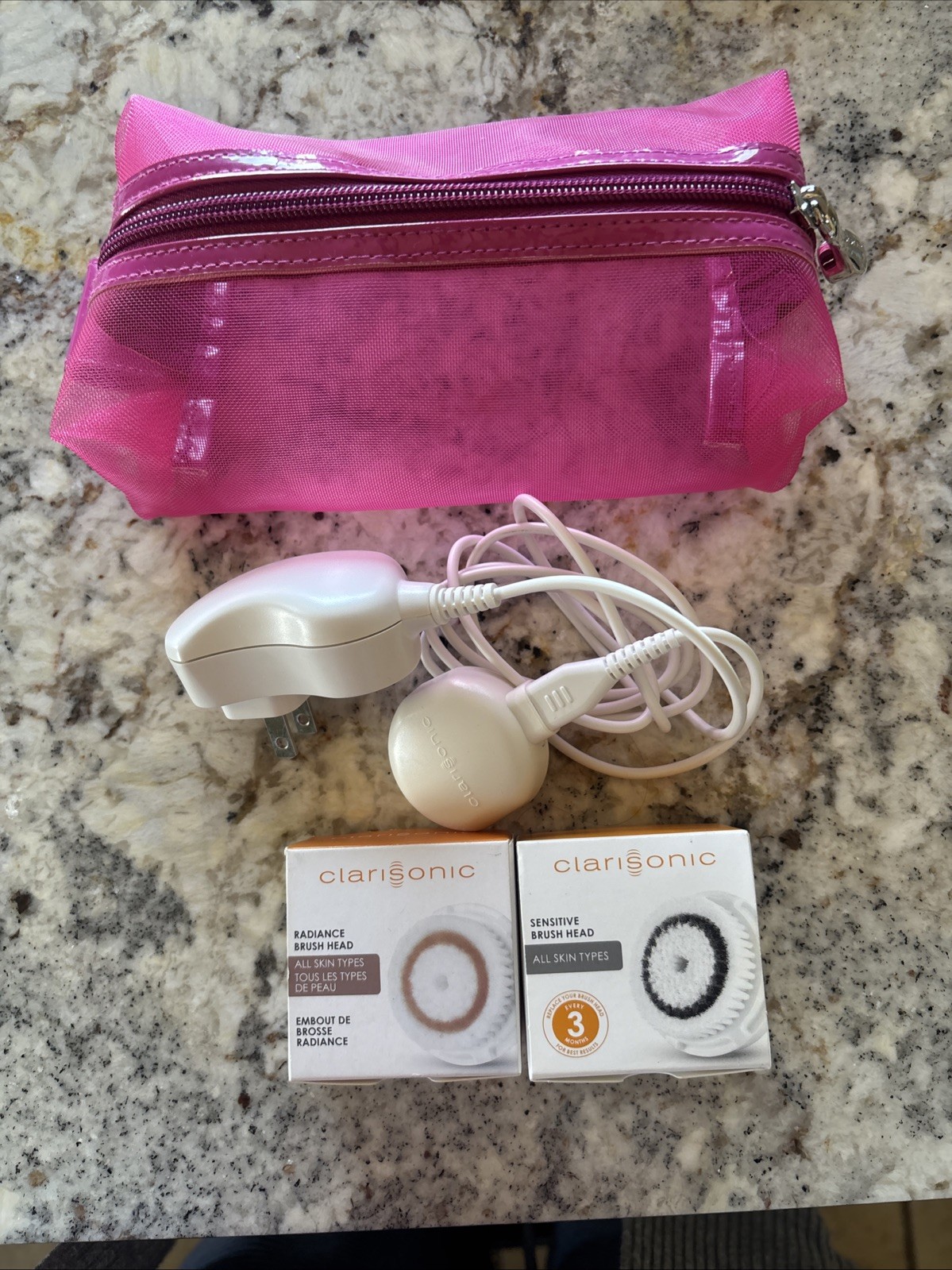 Mixed Lot of Clarisonic Items New Charger, Case, Radiance/Sensitive Brush Heads